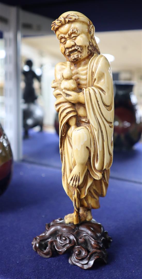 A 19th century Chinese ivory figure, Li Tieguai, height 20cm